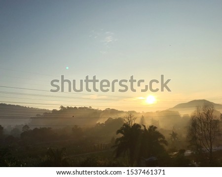 Landscape photography of sunrise from side of highway with golden and beautiful scenery.