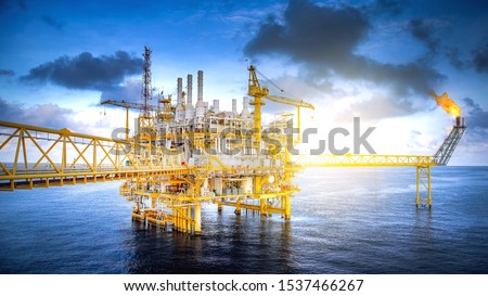 Large offshore drilling oil rig plant in the gulf Royalty-Free Stock Photo #1537466267
