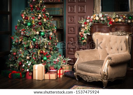Christmas room with fireplace and armchair