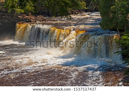 Powerfall Manabezho Falls in the Spring on the Presque Isle River in Porcupine Mountains State Park in Michigan