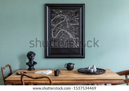 Stylish and design dining room interior with black mock up poster map, wooden table, chairs, teapot with cups, modern decoration, sculpture and elegant accessories. Ready to use. Template. 