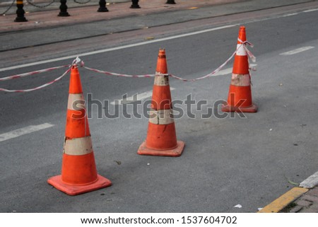 Traffic cones on the road.