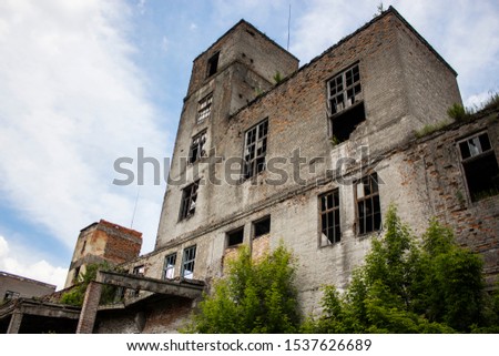 Old abandoned factory buildings. Abandoned scary house
