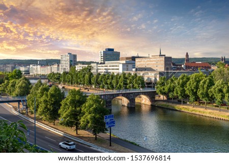 Saarbrücken, Saarland, View of city center with old bridge at sundown Royalty-Free Stock Photo #1537696814