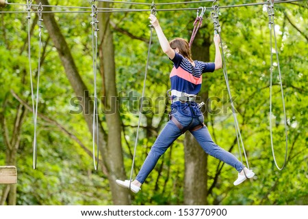 Girl in the adventure park