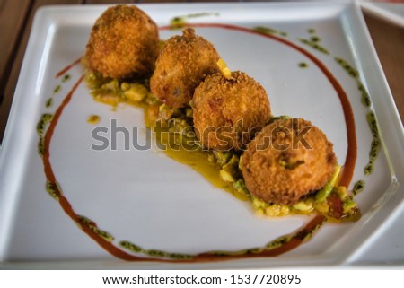Delicious Risotto Croquettes plate for appetizer Royalty-Free Stock Photo #1537720895
