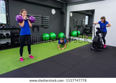 Merged photo of person performing various exercises in local gym.