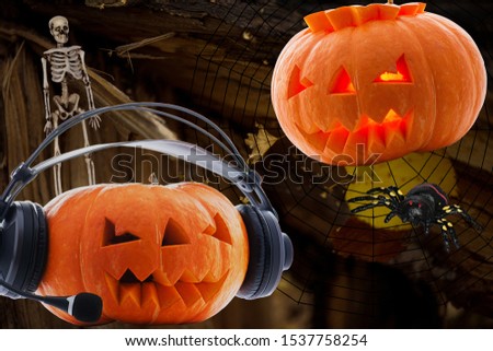Two pumpkins for Halloween with burning and no eyes in the headphones and without with a scary skeleton insidious spider on an abstract background