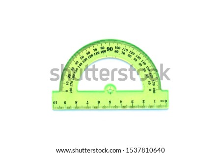 Plastic circular protractor with a ruler on white background.