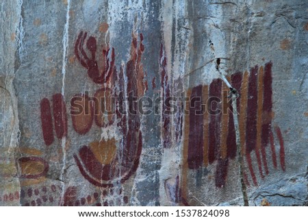 Rock painting in the region of Peruacu River Valley (in Portuguese: "Vale do rio Peruaçu" - State of Minas Gerais - Southeast Brazil. The picture seems to depict a man falling down.