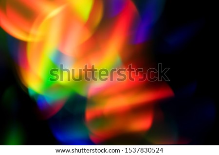Abstract colorful bright bokeh rainbow blur background