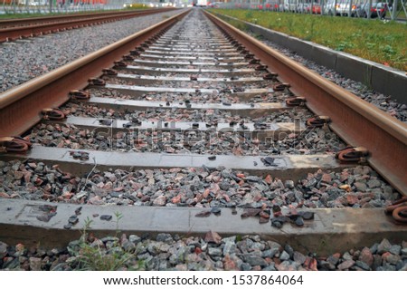 Photo background with railroad rails and sleepers.

