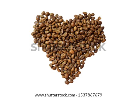 Tasty coffee beans are gathered in the form of a heart (coffee heart)