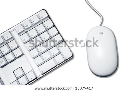 Conceptual picture with white mouse and part of computer keyboard. Isolation on white with clipping path.