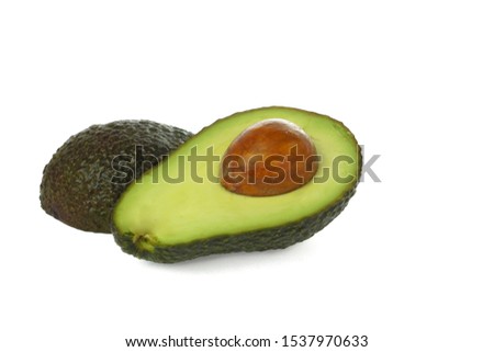 Avocado with leaf isolated on white Clipping Path. Professional food photography 