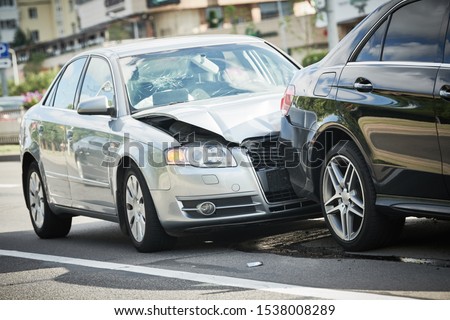 car crash accident on street. damaged automobiles Royalty-Free Stock Photo #1538008289