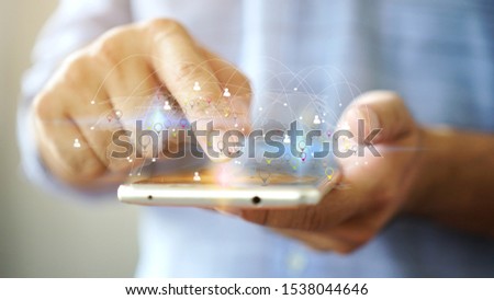Hand using smartphone connecting to internet, Social network concept.                                  