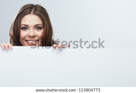 Business woman face looking out white banner. Female model
