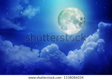 Super moon.Full moon with night sky in the clouds ,Elements of this image furnished by NASA.