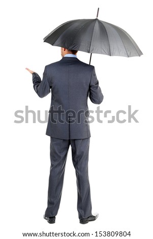 Businessman with umbrella, isolated on white