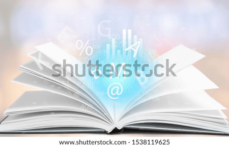 Open book isolated on white and letters