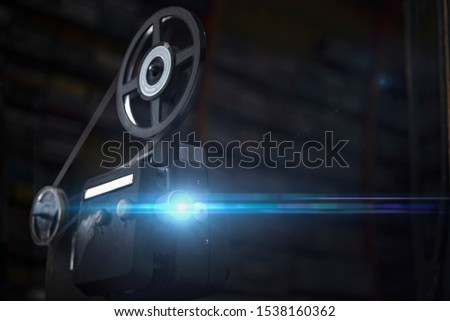 Projector showing the movie in the dark