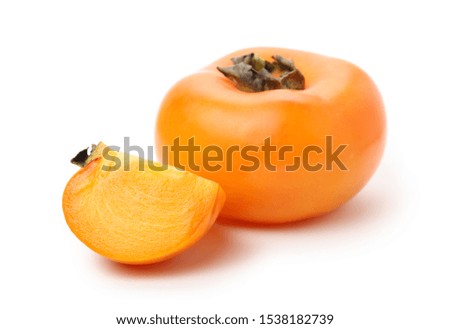  cut ripe persimmon on white background stock photo