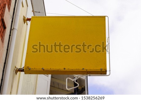Signboard shop Mock up yellow square shape Shop front display for sign logo boutique