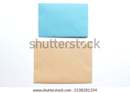 Blank paper envelopes, letters for mail on white background, flat lay, top view. Concept postal service or greeting card
