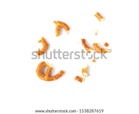pretzel crumbs on a white background Royalty-Free Stock Photo #1538287619