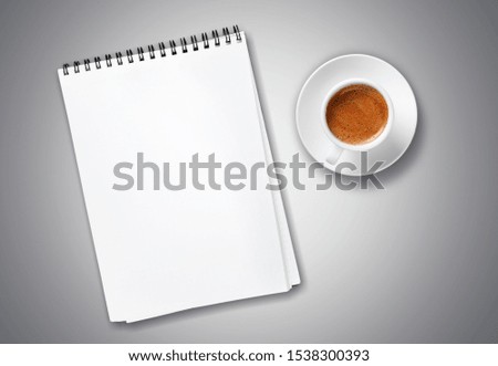 Blank paper sheets for brochure and cup of coffee on grey background, flat lay. Mock up