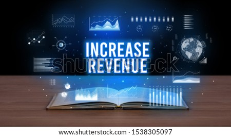 INCREASE REVENUE inscription coming out from an open book, creative business concept