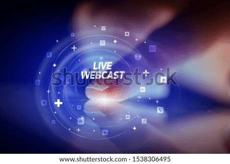 Finger touching tablet with social media icons and LIVE WEBCAST