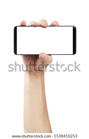 Hand holding a black smartphone, isolated on white background