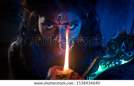. Diwali Look Photo-shoot based on   ‘KALI PUJA’ Festival with ethnic look. like A face of Hindu goddess kali   Royalty-Free Stock Photo #1538434640