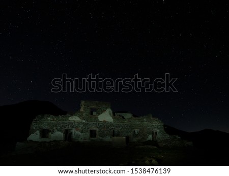 Night photography in the Escullos. Cabo de Gata. The ruins are a former barracks of Guardia Civil (Spanish police).