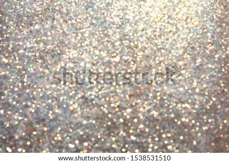 Blurred Bokeh. Holiday glowing backdrop. Christmas light background. Defocused Background With Blinking Stars.