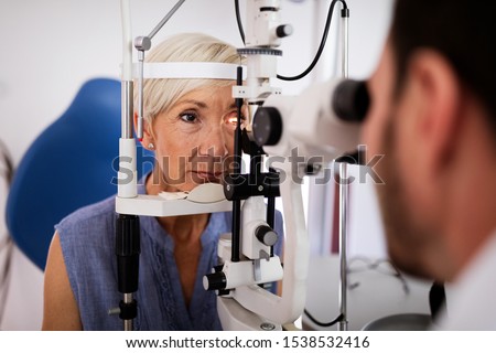 Ophthalmology concept. Patient eye vision examination in ophthalmological clinic Royalty-Free Stock Photo #1538532416