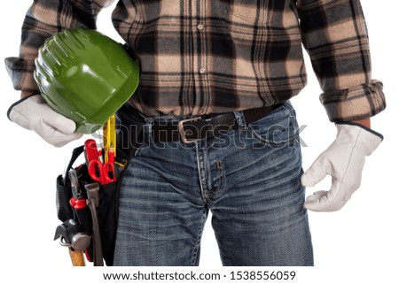 Adult craftsman carpenter isolated on white background, he wears leather work gloves and holds a protective helmet. Work tools industry construction and do it yourself housework. Stock photography.