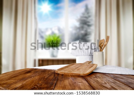 Winter background of free space for your decoration and blurred window sill. Snowflakes and frost decoration. Christmas time. 