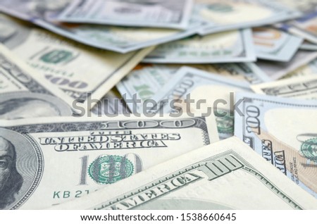 Top view of one hundred dollar banknotes made background. USD currency concept and rich life