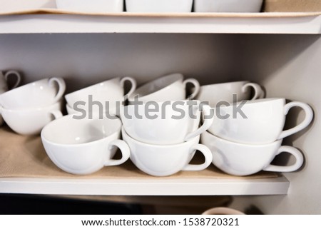 Classic closeup of white empty tea cups. Design Style with space. Background concept. Art Mockup view. Wood texture. Modern collection for lifestyle. Coffee break for drink. Simple life. Mixed media.