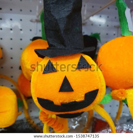 Macro photo decorative Halloween pumpkin. Stock photo Halloween decor pumpkin