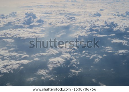 Aerial view of clouds seen from the window