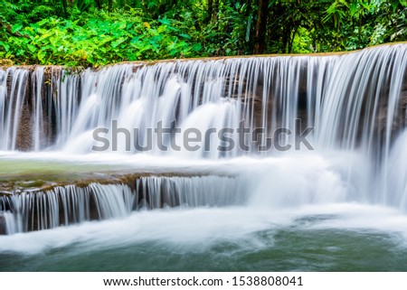 Waterfall and blue emerald water color in Huay mae kamin waterfall 