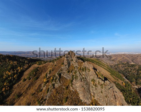 Autumn landscape, view of the city from the national park, aerial shooting