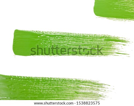 set of green paint brush strokes on white background 