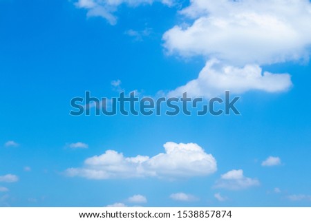 Air clouds in the blue sky background