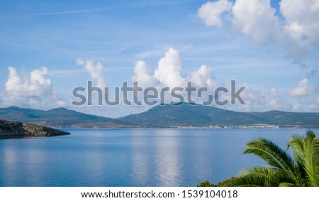 Amazing view of sea and mountain, beautiful blue sky and white clouds  at private summerhouse in Izmir Turkey.