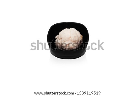 Ice cream on a black cup White background